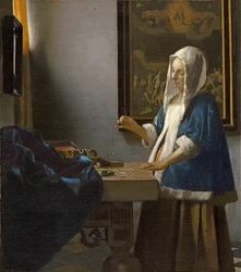 Woman Holding a Balance