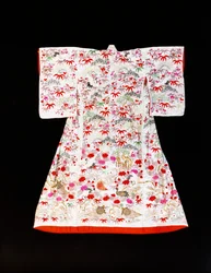 A furisode of white silk damask stencilled with bamboo leaves and plum blossom