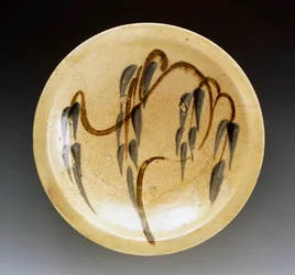 Enamel stoneware plate used by nishin-zara sellers (stewed herring) decorated with willow tree