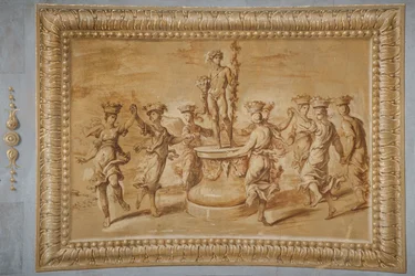 Faux gilded relief, with Bacchus placed on a circular pedestal decorated with festoons and bucrania, and surrounded by dancing canephors