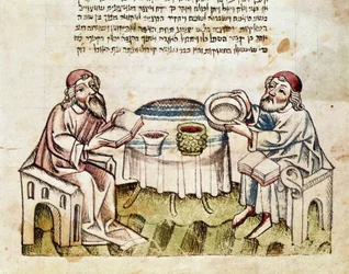 Judaism: two rabbis celebrate Passover with the ceremony of the Seder (Miniature from a Mahzor, 15th century)