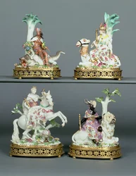 Four Meissen groups representing the Four Continents mounted with Louis XVI ormolu, modelled by Johann Joachim Kandler, mid 18th century