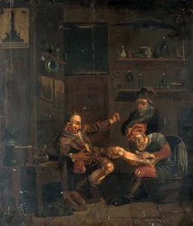 A surgeon treating a man