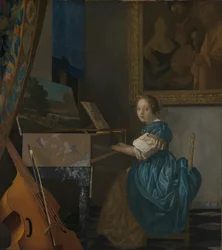 A Young Woman Seated at a Virginal