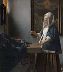 Woman Holding a Balance