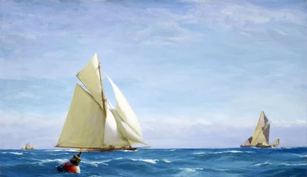 A large sailboat and a barge on the Thames, off the coast of a port, circa 1910
