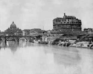 San Angelo castle and bridge over Tiber river, in the background: basilica Saint Peter in Rome