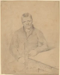 Man Seated at a Table