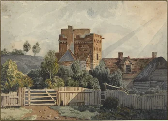 House with stone tower