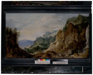 A Panoramic Mountainous Landscape with Journeymen Giving to the Poor, Packhorses Beyond