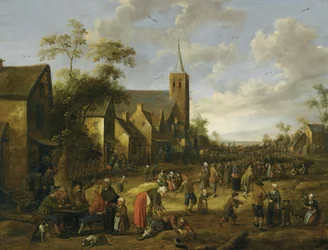 A Busy Village Street with Numerous Figures, Peasants Eating and Drinking at a Table in Foreground, a Church Tower Beyond