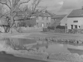 Stream in foreground at Morland and Orton with ford to left of image