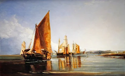 A fully laden barge under sail