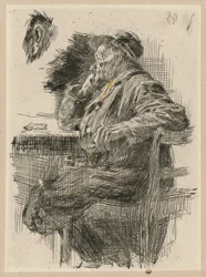 Man Sitting at a Table