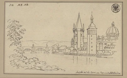 View of Charles Bridge in Prague with the Old Town Bridge Tower and the dome of the Church of the Knights of the Cross