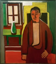 Man Standing by the Window