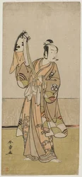 Bando Hikosaburo III Holding a Hand Puppet