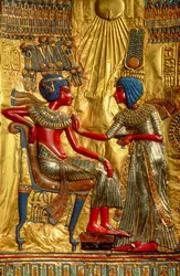 Detail of figures on interior back of the gold throne depicting Tutankhamun and his wife, Egypt, 2009