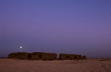 Full moon setting over Shunet of Khasekhemuy, Abydos, Egypt