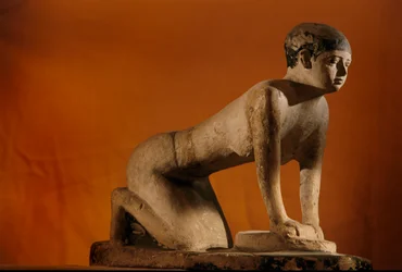 Painted limestone statue of a servant grinding grain, Old Kingdom, 2002