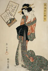 Young woman adjusting a brooch in her hair