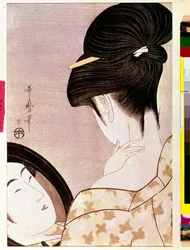 A woman powdering her neck with shade
