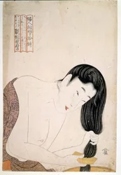 Woman painting herself. Artwork by Utamaro Kitagawa (1753-1806).