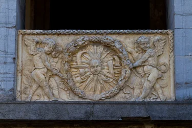 Balustrade Plate with Rayed Sun in Garland, Bas-Relief on Facade of San Sebastiano Church