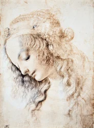 Portrait of a girl with closed eyes and head down with her hair adorned with a band enriched with jewellery