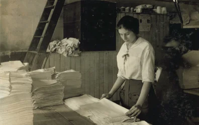 15-Year-Old Girl Folding Towels in Bonanno Laundry, Boston, Massachusetts
