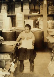 A Girl Folding Filing-Folders at the Boston Index Card Co. at 113 Purchase Street in Boston, Massachusetts