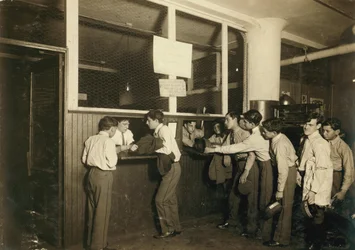 Messenger Boys Turning in Uniforms at Postal Telegraph Co., New York City