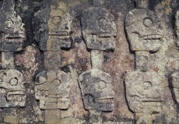 Relief depicting human skulls, detail of the Tzompantli, or Wall of Skulls, archaeological site of Chichen Itza