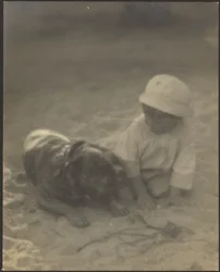 Boy Sitting with Dog