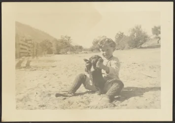 Boy and Dog on Beach