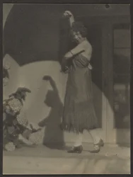 Female Dancer before House