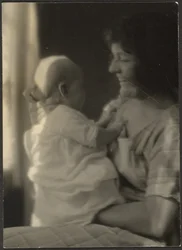 Florence Holding a Baby
