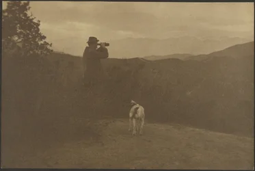 Hiker Looking Through Telescope