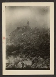 Man Atop Rock Pile