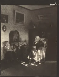 Man and Boy Seated in a Study