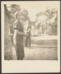 Man and Woman Playing Croquet