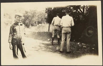 Men Outside with Junk