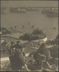 Men Seated in Boats