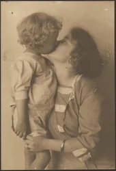 [Mother and Child Kissing]