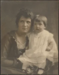 [Mother and child in white gown]