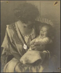 Mother in Embroidered Robe and Infant