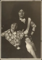 Portrait of Two Women in Ornate Outfits