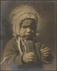 Portrait of a Child Wearing a Bonnet