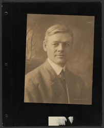 Portrait of a Man Seated Before a Painted Backdrop