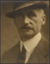 Portrait of a Man with Straw Hat